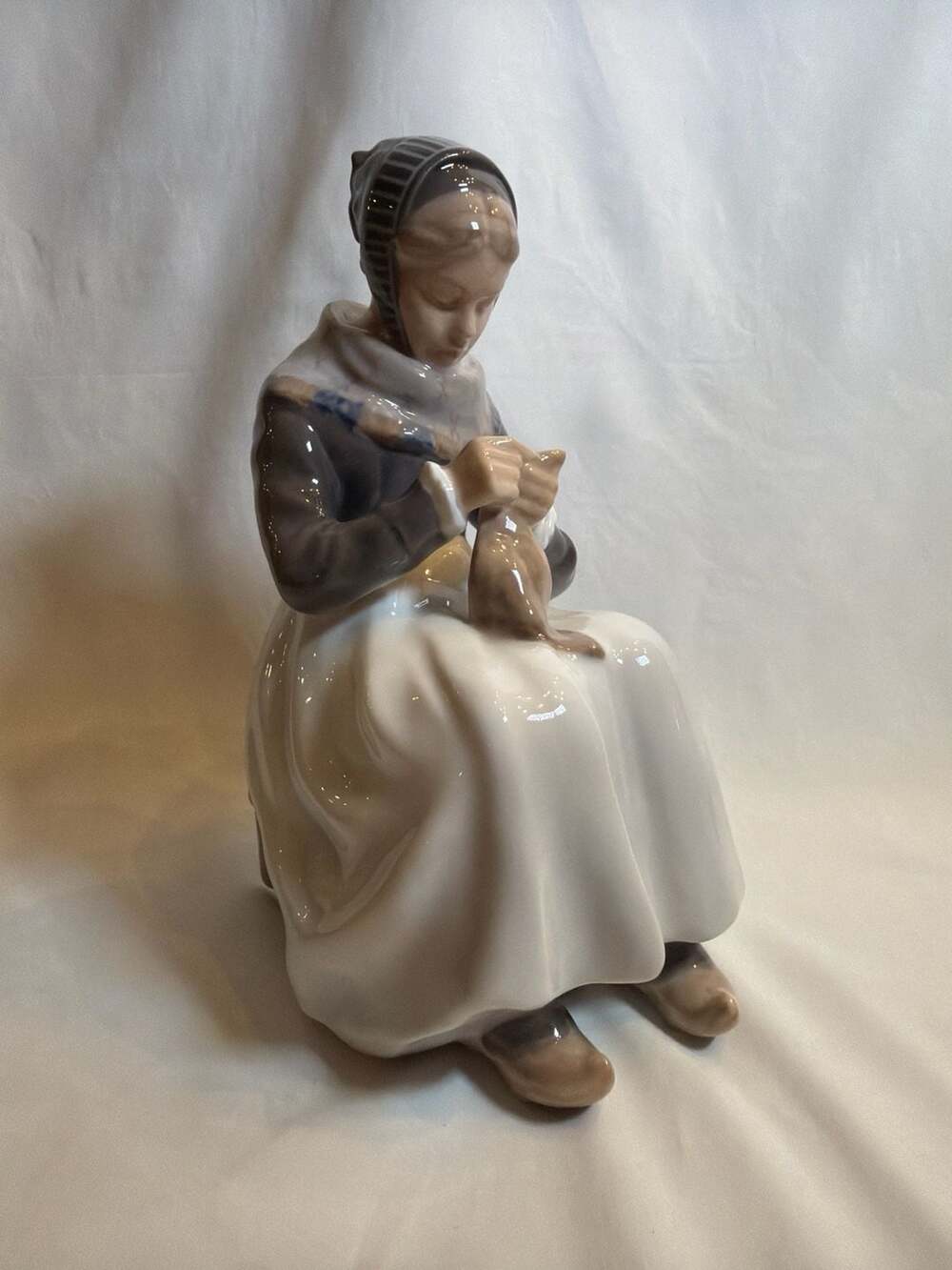 Royal Copenhagen #1317 Amager Girl Knitting Figurine by Lotte Benter